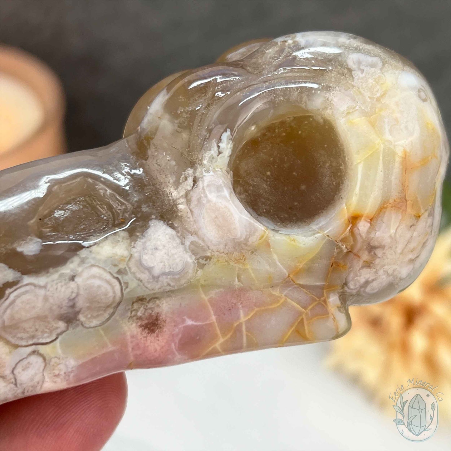 Polished Flower Agate Raven's Skull Carving