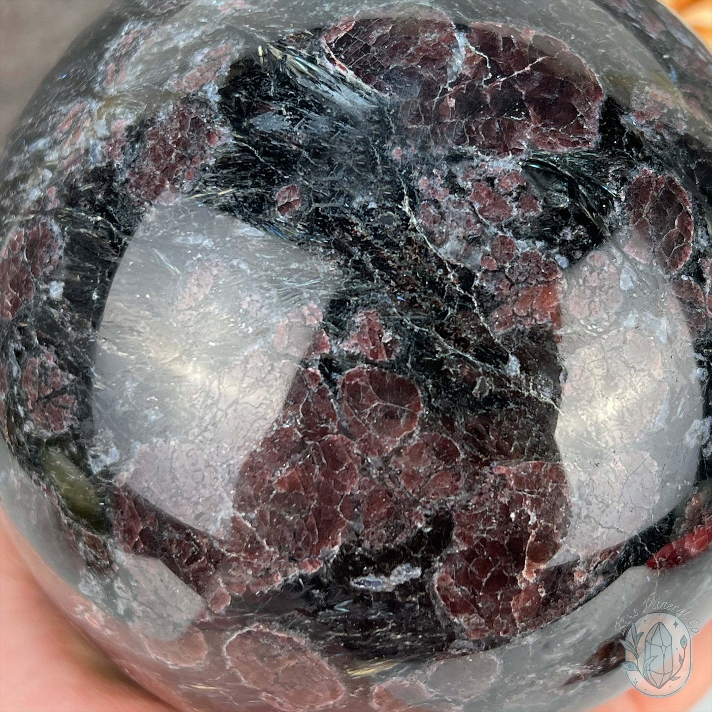 101mm Polished Arfvedsonite and Garnet Firework Sphere