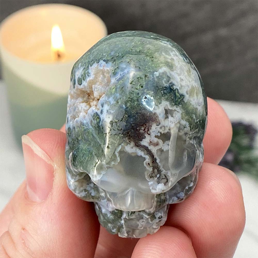 Polished Moss Agate Skull Carving