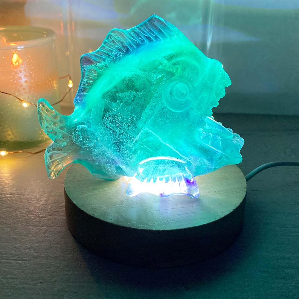 Polished Rainbow Fluorite Crystal Piranha Carving