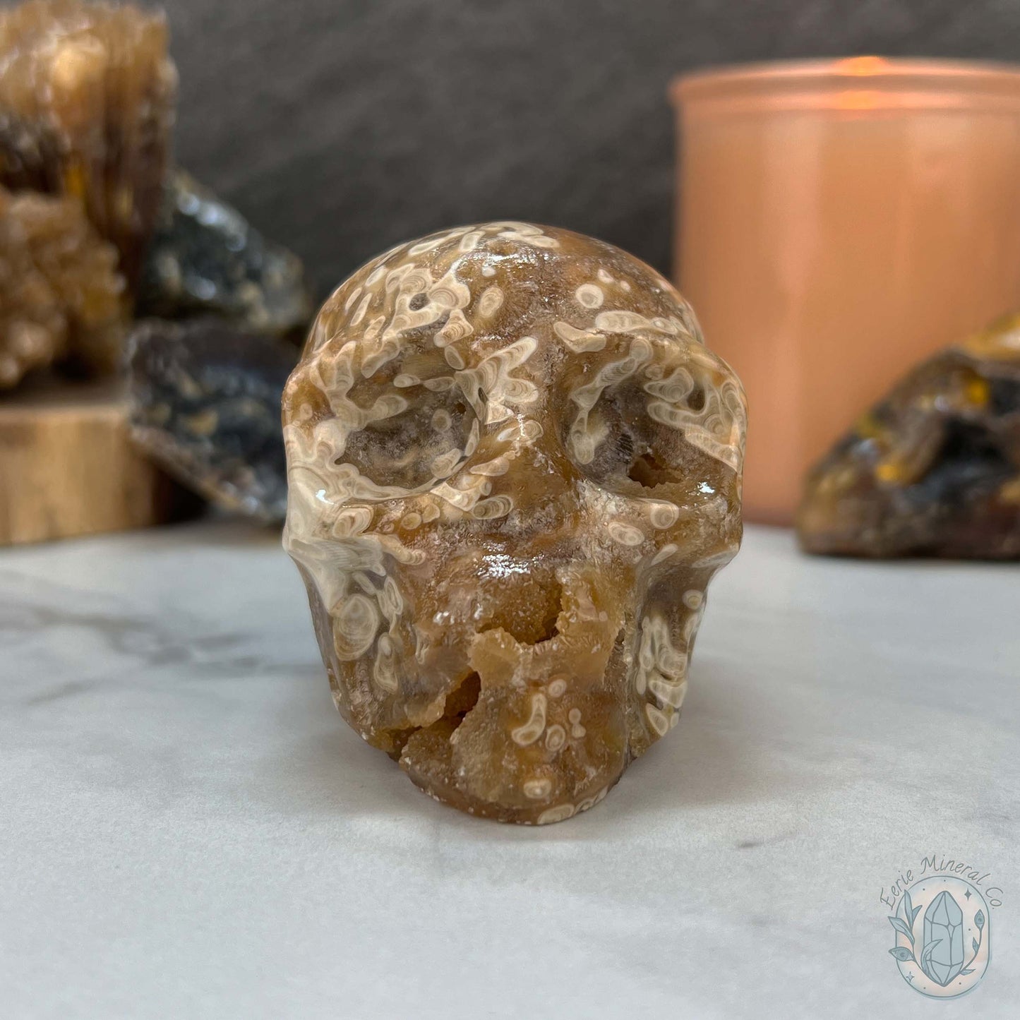 Polished Druzy Amber Calcite Skull Carving
