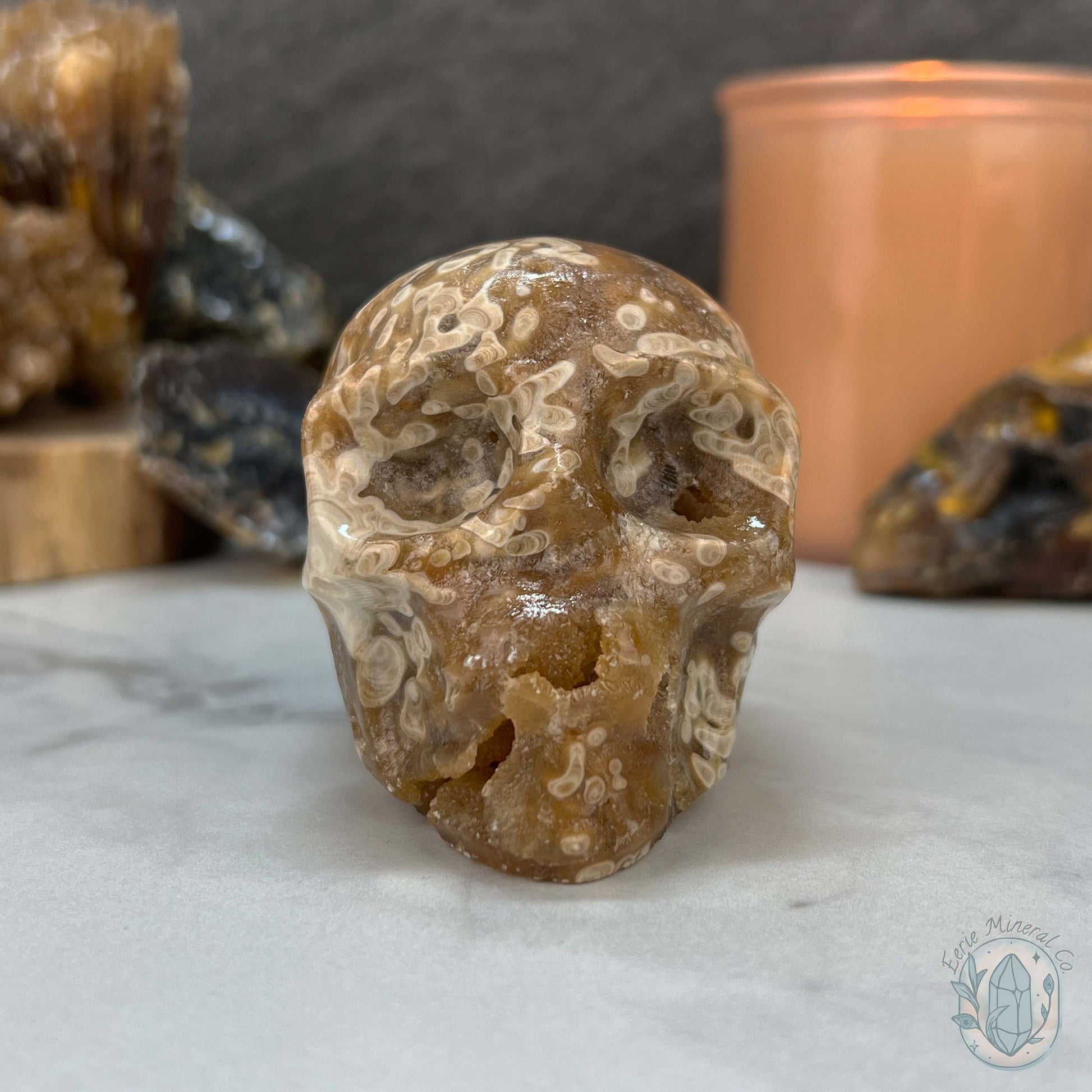 Polished Druzy Amber Calcite Skull Carving