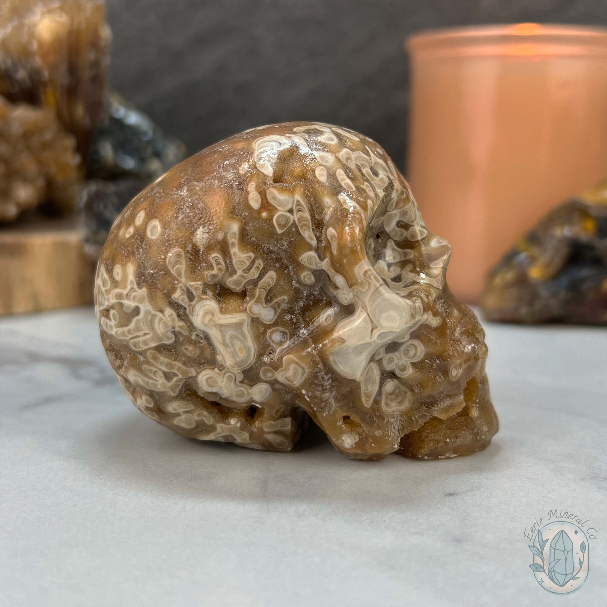Polished Druzy Amber Calcite Skull Carving