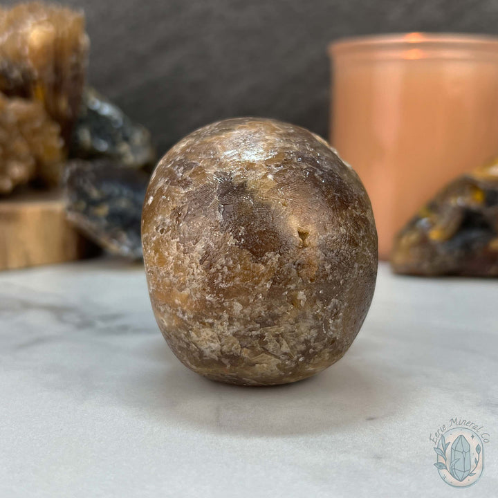 Polished Druzy Amber Calcite Skull Carving