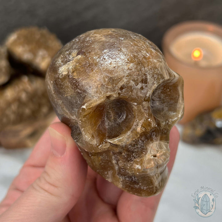 Polished Druzy Amber Calcite Skull Carving