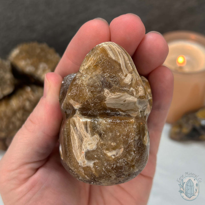 Polished Druzy Amber Calcite Skull Carving