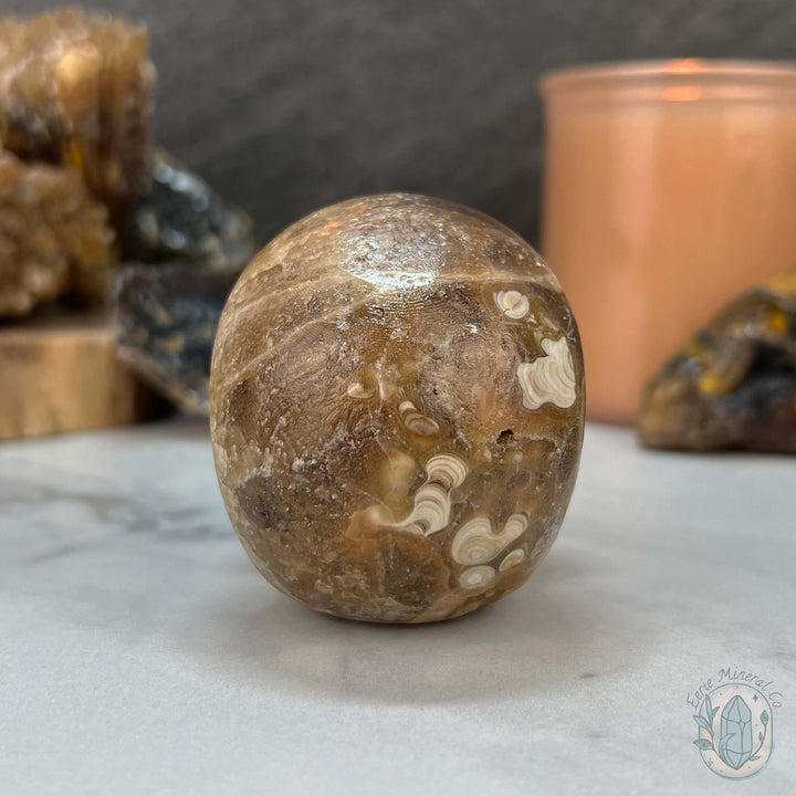 Polished Druzy Amber Calcite Skull Carving