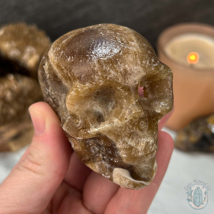 Polished Druzy Amber Calcite Skull Carving