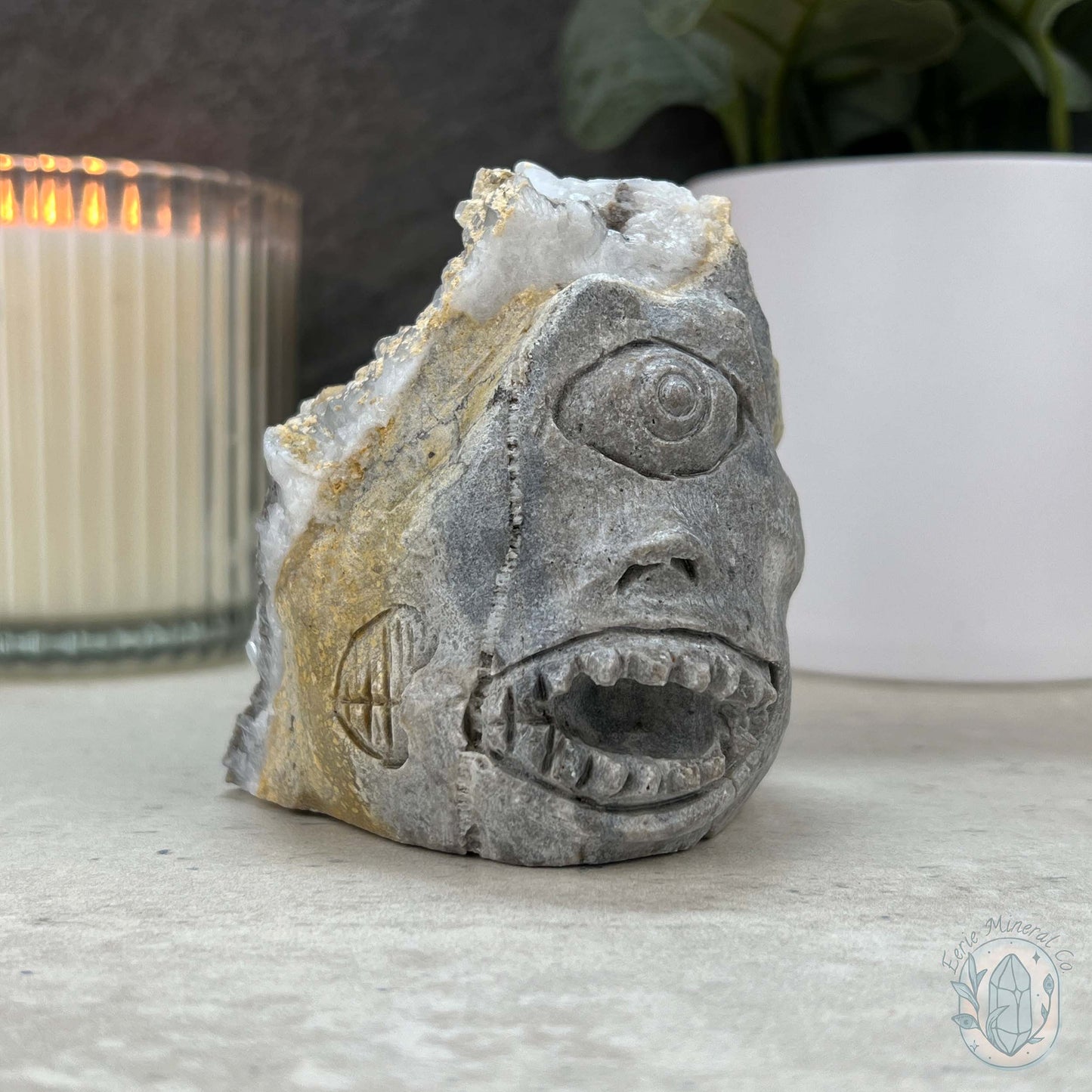Quartz Cluster Playful Cyclops Monster Skull Carving