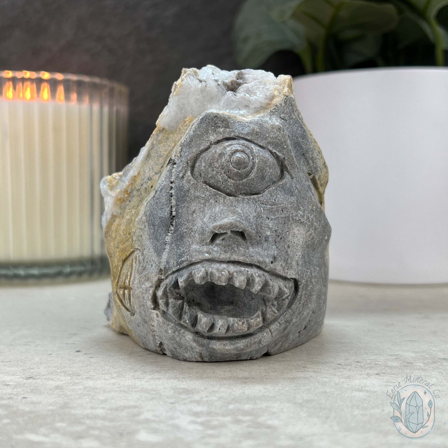 Quartz Cluster Playful Cyclops Monster Skull Carving