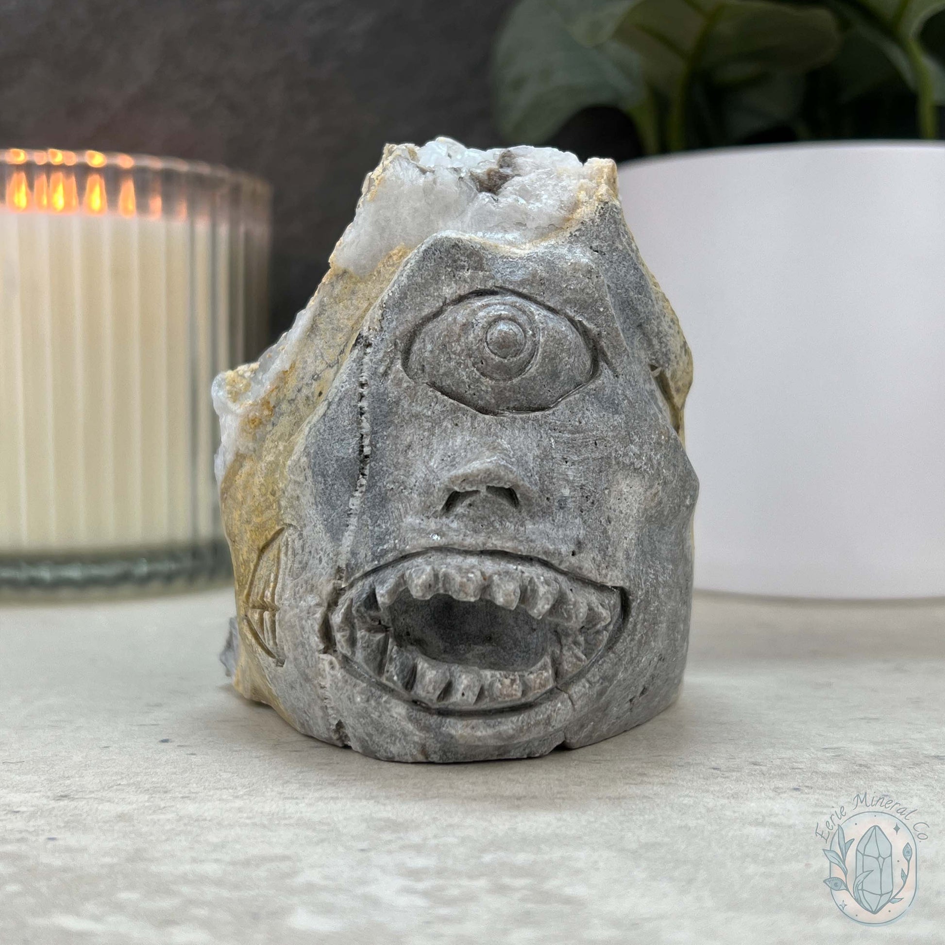 Quartz Cluster Playful Cyclops Monster Skull Carving
