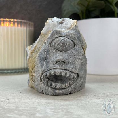 Quartz Cluster Playful Cyclops Monster Skull Carving