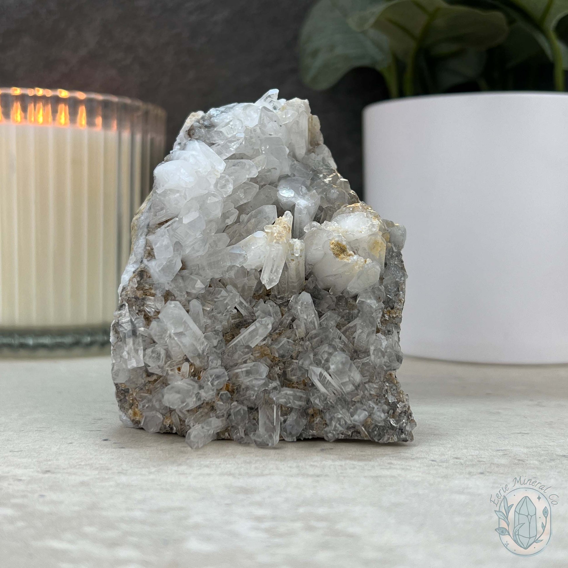 Quartz Cluster Playful Cyclops Monster Skull Carving