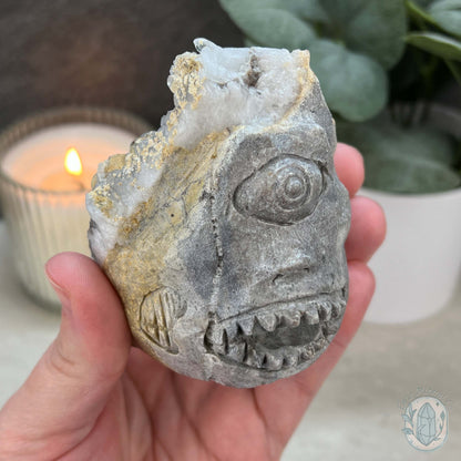 Quartz Cluster Playful Cyclops Monster Skull Carving