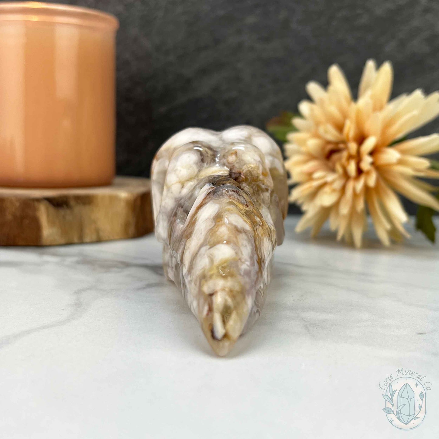 Polished Flower Agate Raven Skull Carving