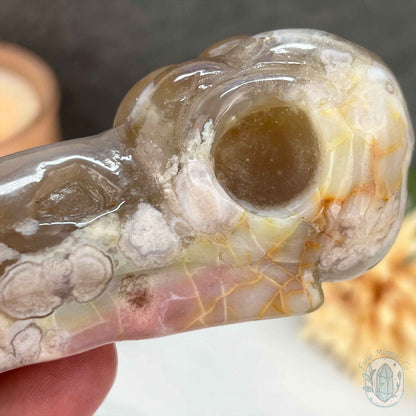 Polished Flower Agate Raven's Skull Carving