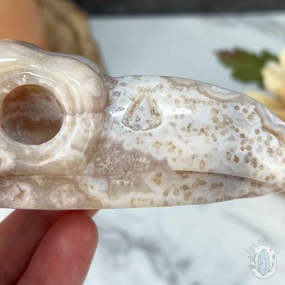 Polished Flower Agate Raven's Skull Carving