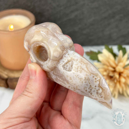 Polished Flower Agate Raven's Skull Carving