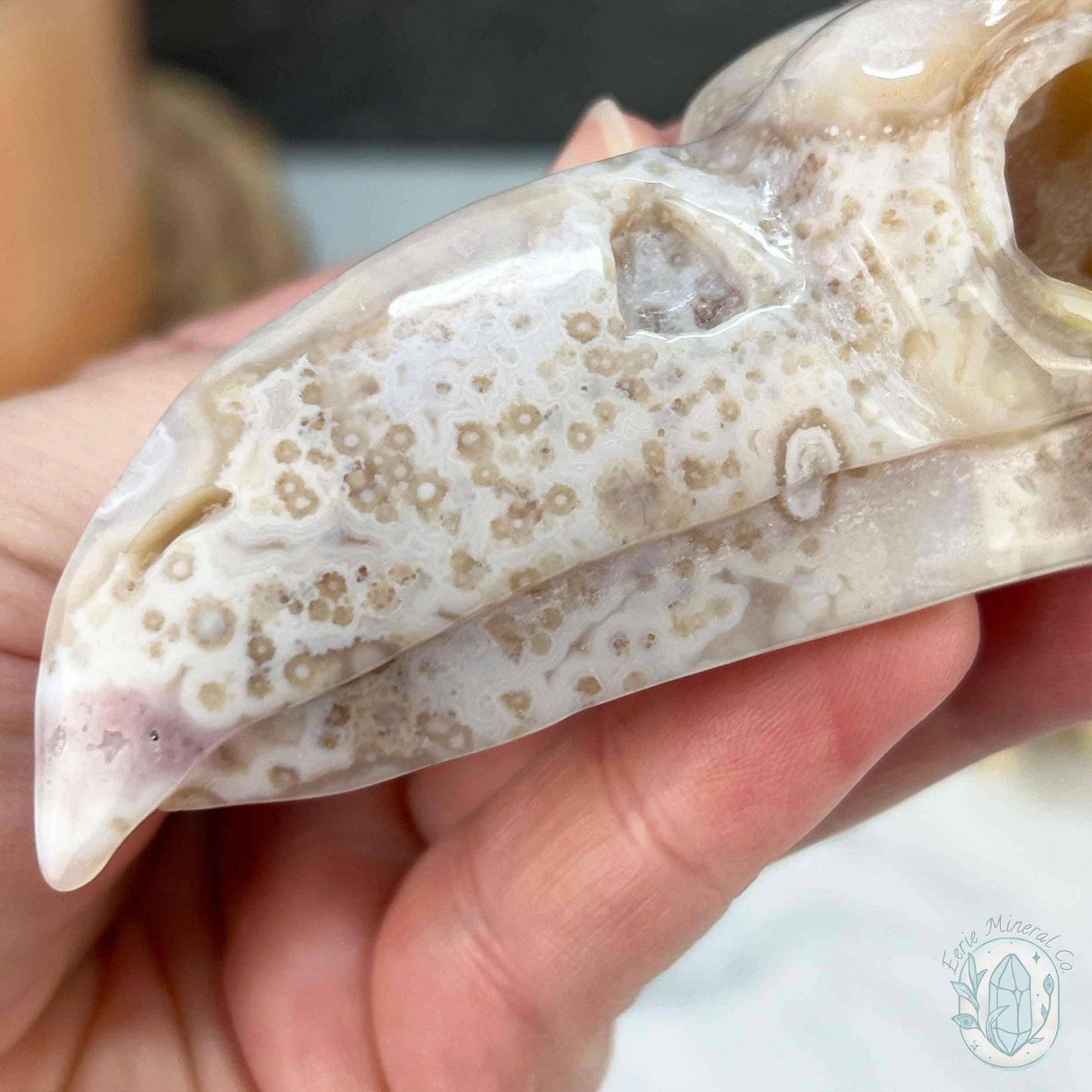 Polished Flower Agate Raven's Skull Carving