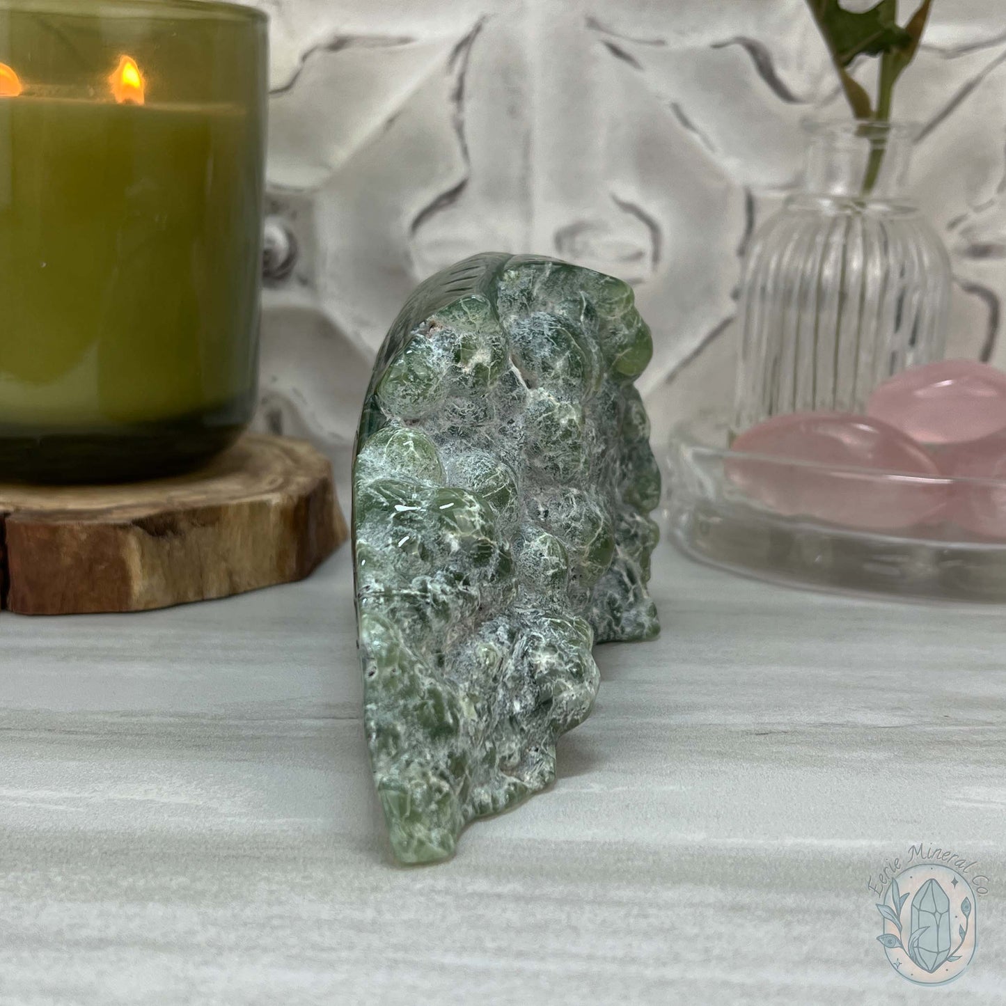Polished Prehnite Skull with Headdress Carving