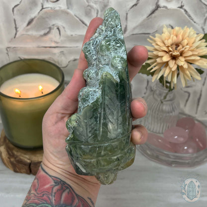 Polished Prehnite Skull with Headdress Carving