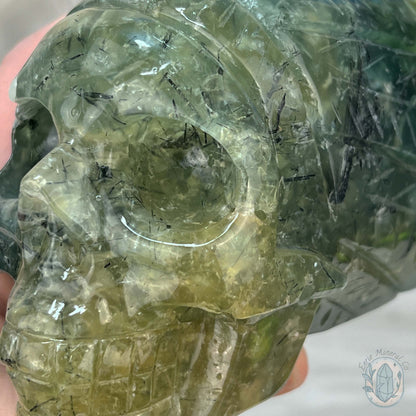 Polished Prehnite Skull with Headdress Carving