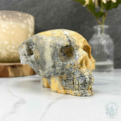 4.60" Polished Quartz Cluster with Pyrite Skull Carving