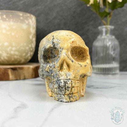 4.60" Polished Quartz Cluster with Pyrite Skull Carving
