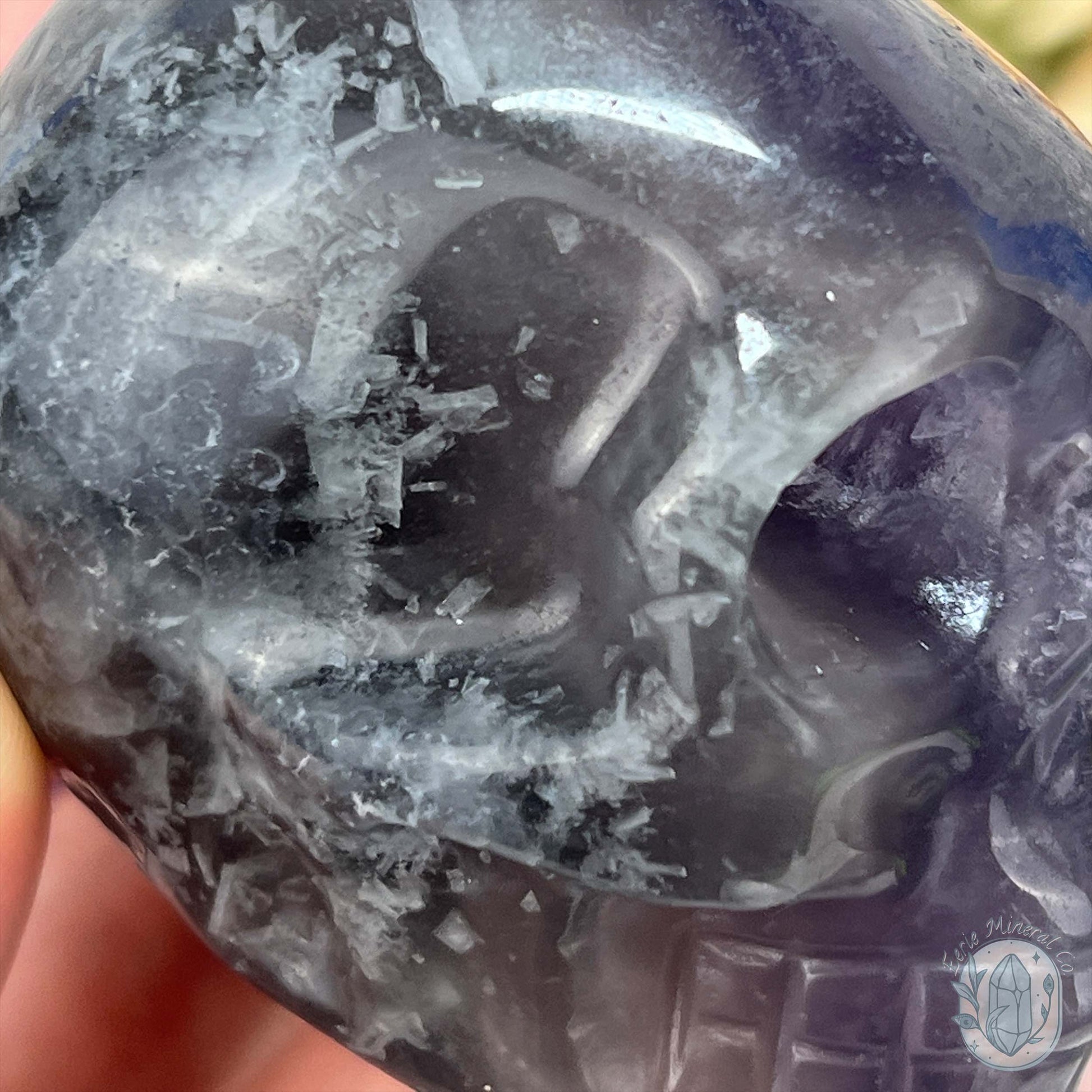 Polished Rainbow Fluorite Skull Carving