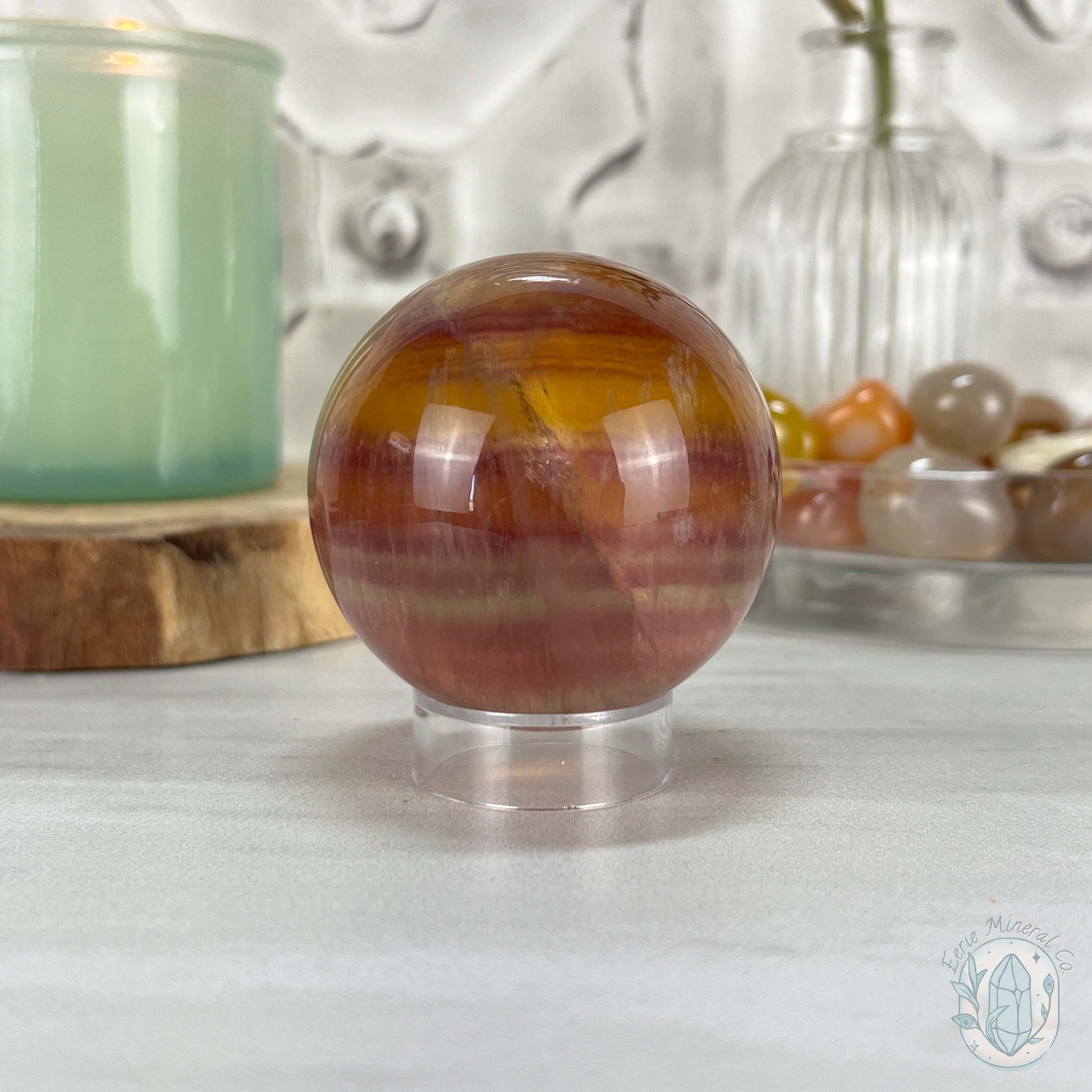 56mm Polished Yellow and Purple Fluorite Sphere with Flash