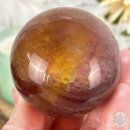 56mm Polished Yellow and Purple Fluorite Sphere with Flash