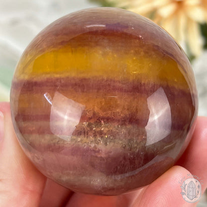 56mm Polished Yellow and Purple Fluorite Sphere with Flash