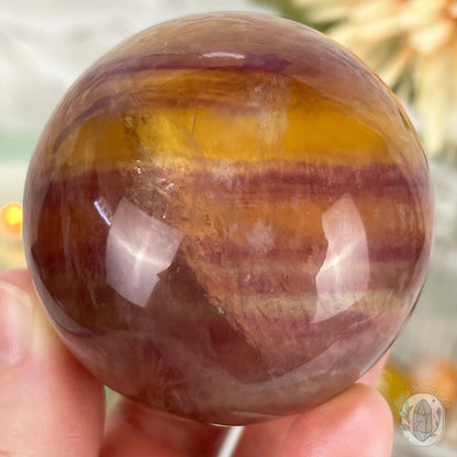 56mm Polished Yellow and Purple Fluorite Sphere with Flash