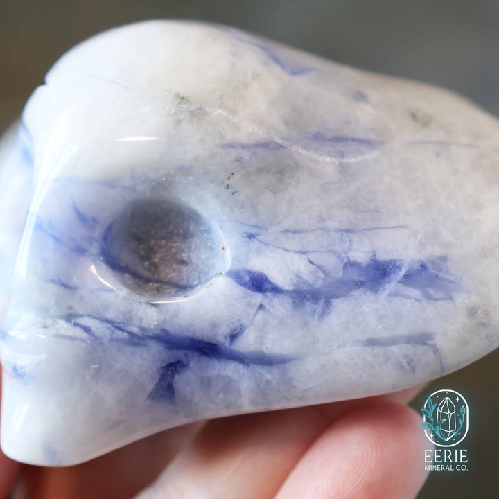 Sodalite Alien head carving on display stand - uv reactive