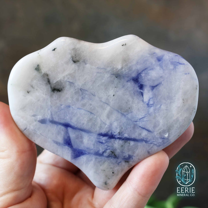 Sodalite Alien head carving on display stand - uv reactive