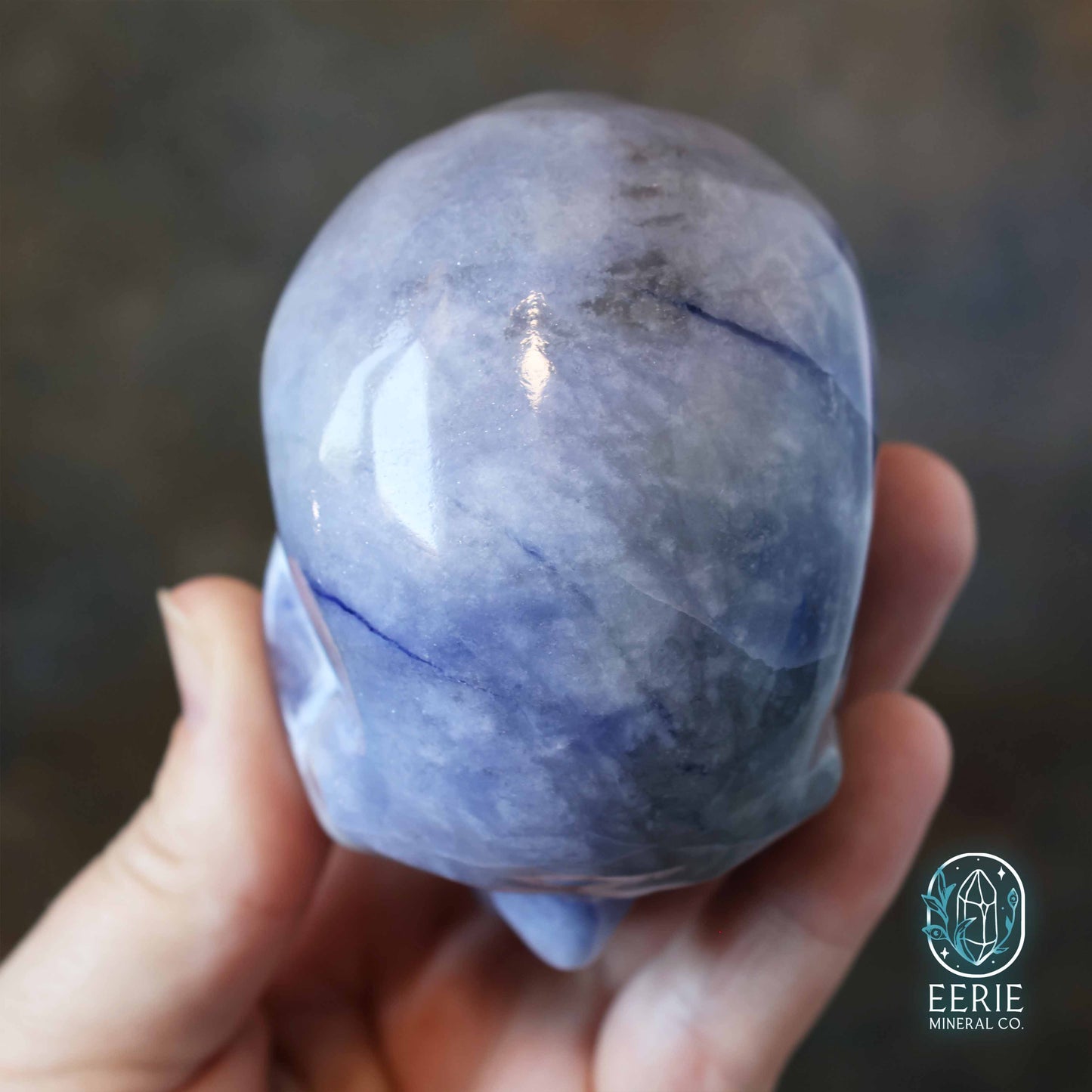 UV Reactive sodalite crystal skull carving
