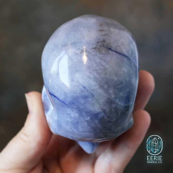 UV Reactive sodalite crystal skull carving