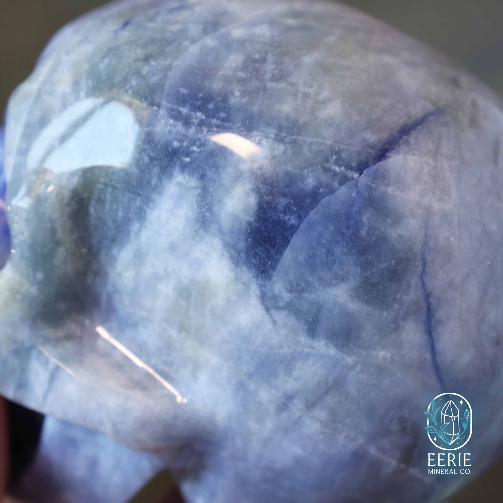 UV Reactive sodalite crystal skull carving