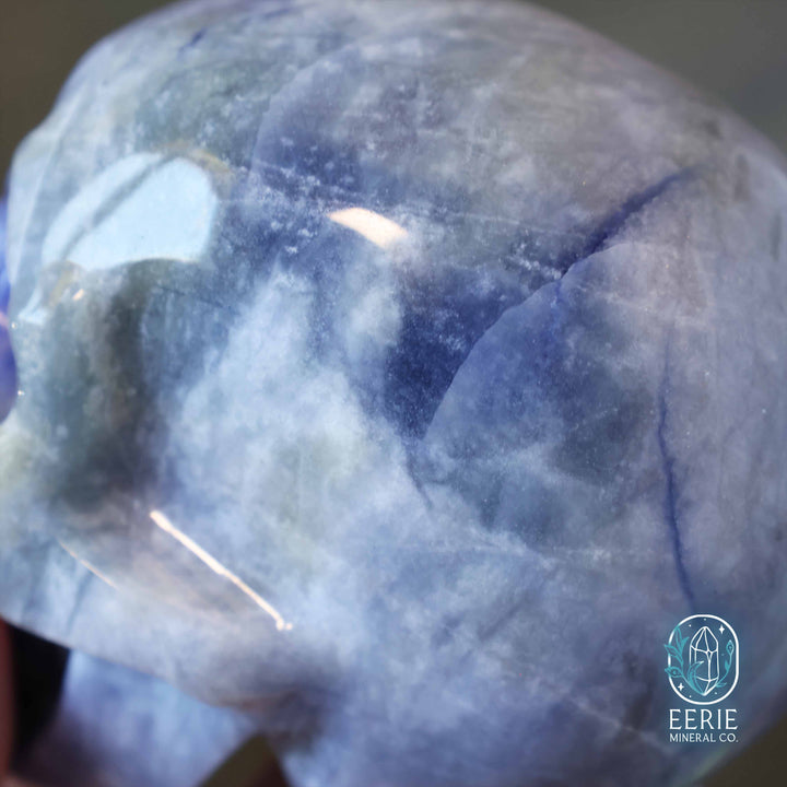 UV Reactive sodalite crystal skull carving