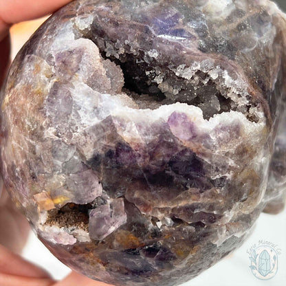 Polished Sphalerite with Purple Fluorite Skull Carving