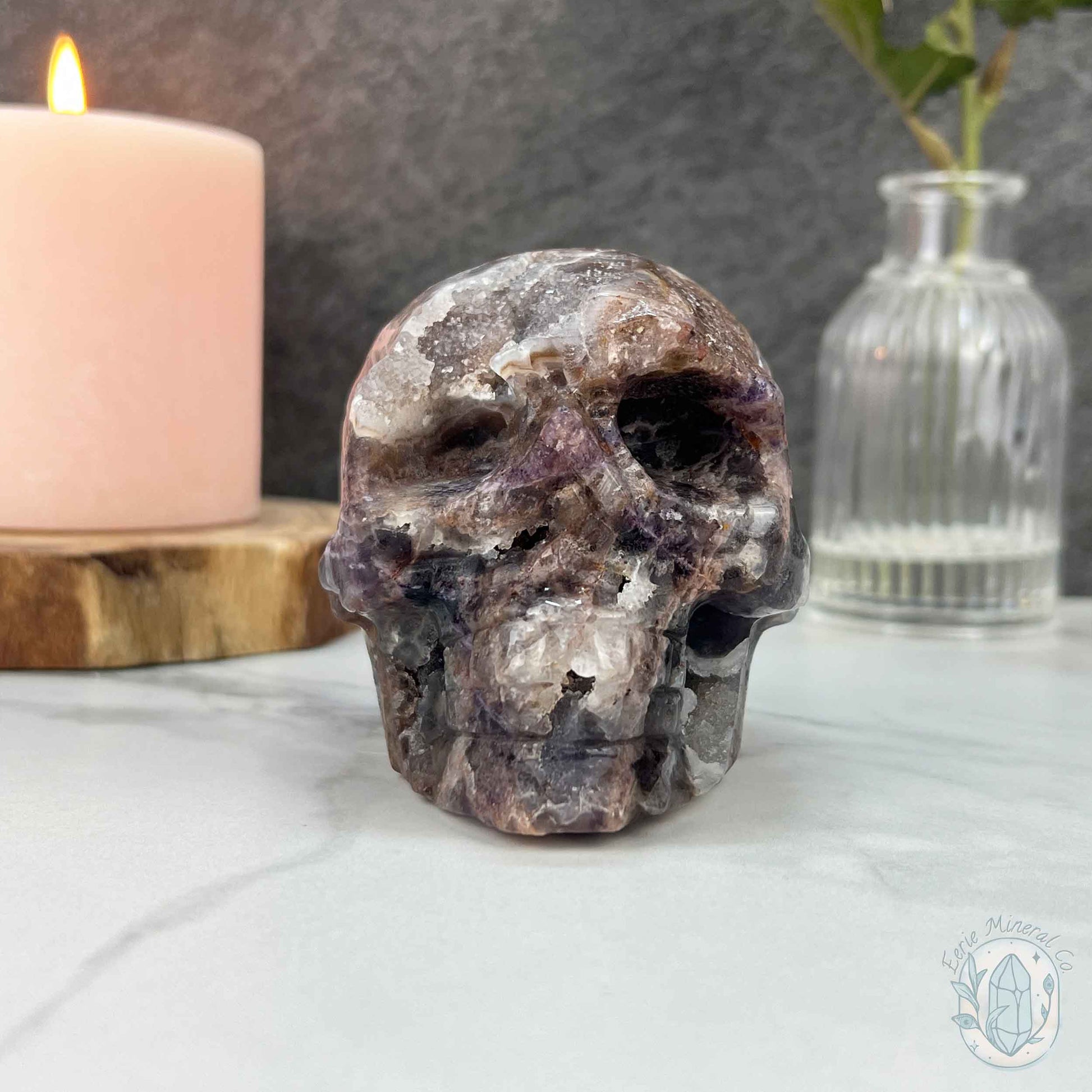 Polished Sphalerite with Purple Fluorite Skull Carving