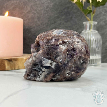 Polished Sphalerite with Purple Fluorite Skull Carving