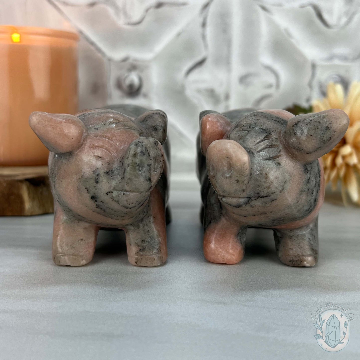 Polished Pair of Sunstone with Hornblende Pig Carvings