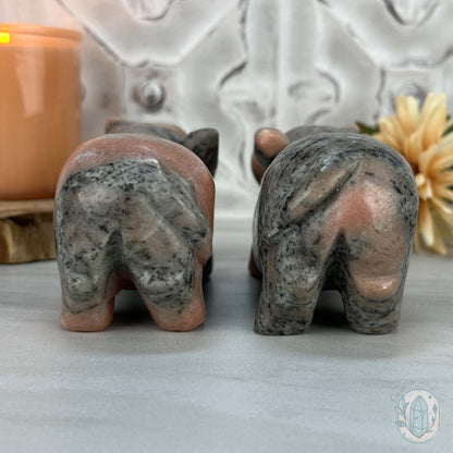 Polished Pair of Sunstone with Hornblende Pig Carvings