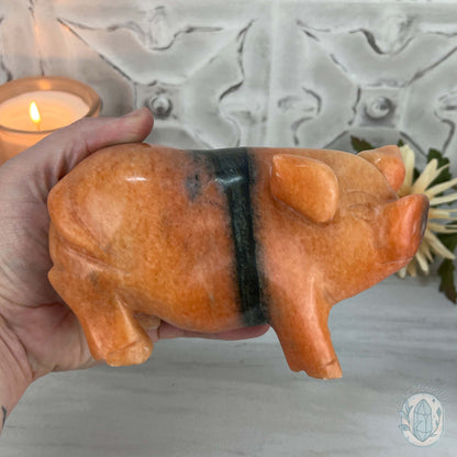 Polished Pair of Sunstone with Hornblende Pig Carvings