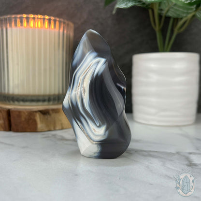 Polished Black and White Orca Agate Flame Carving