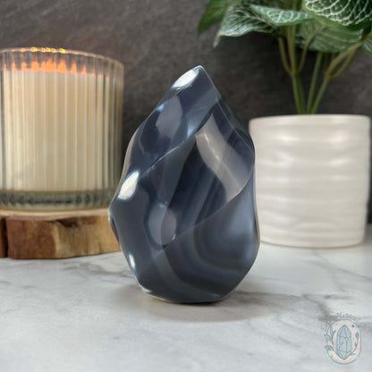 Polished Black and White Orca Agate Flame Carving