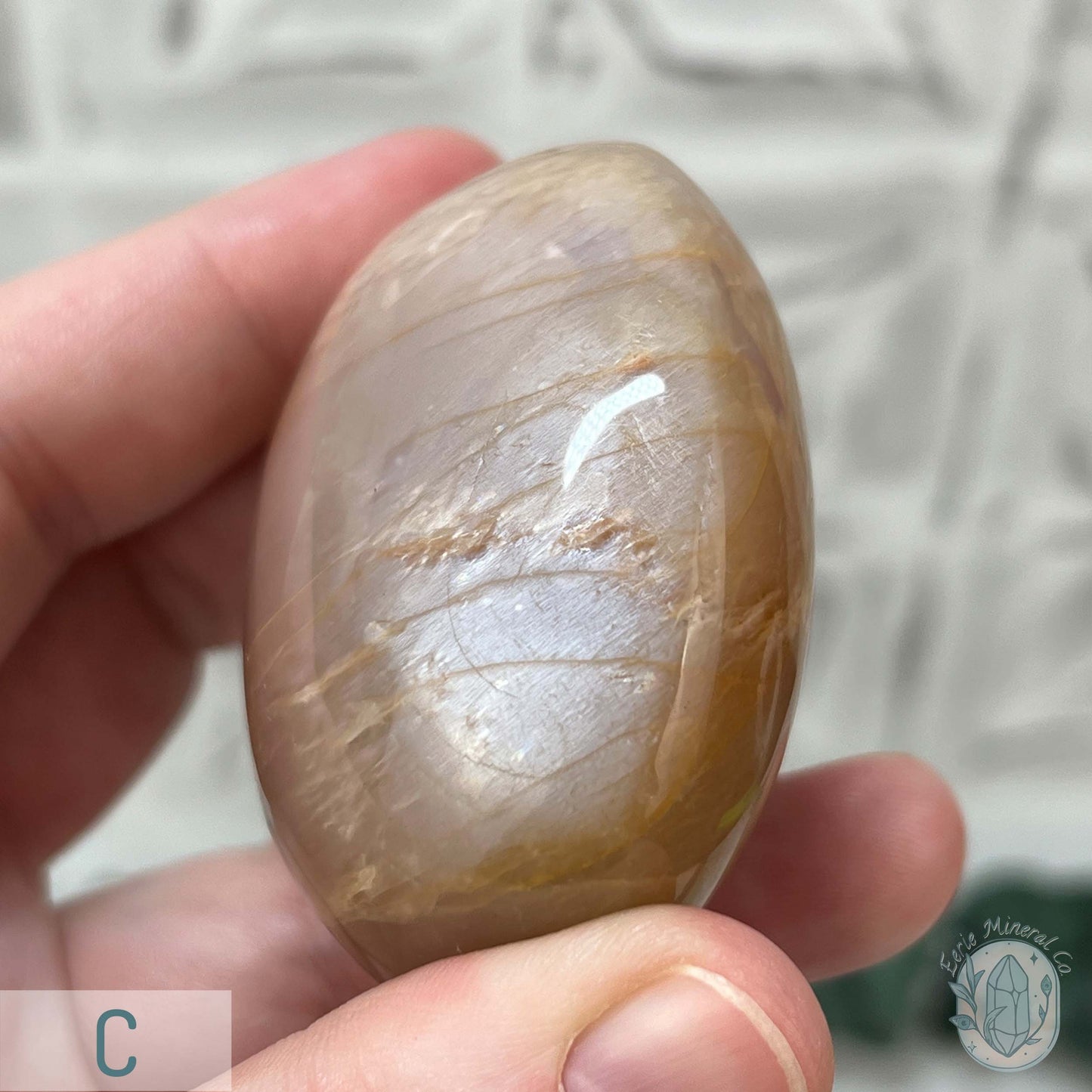 Peach Mooonstone With Silver Flash Palm Stones
