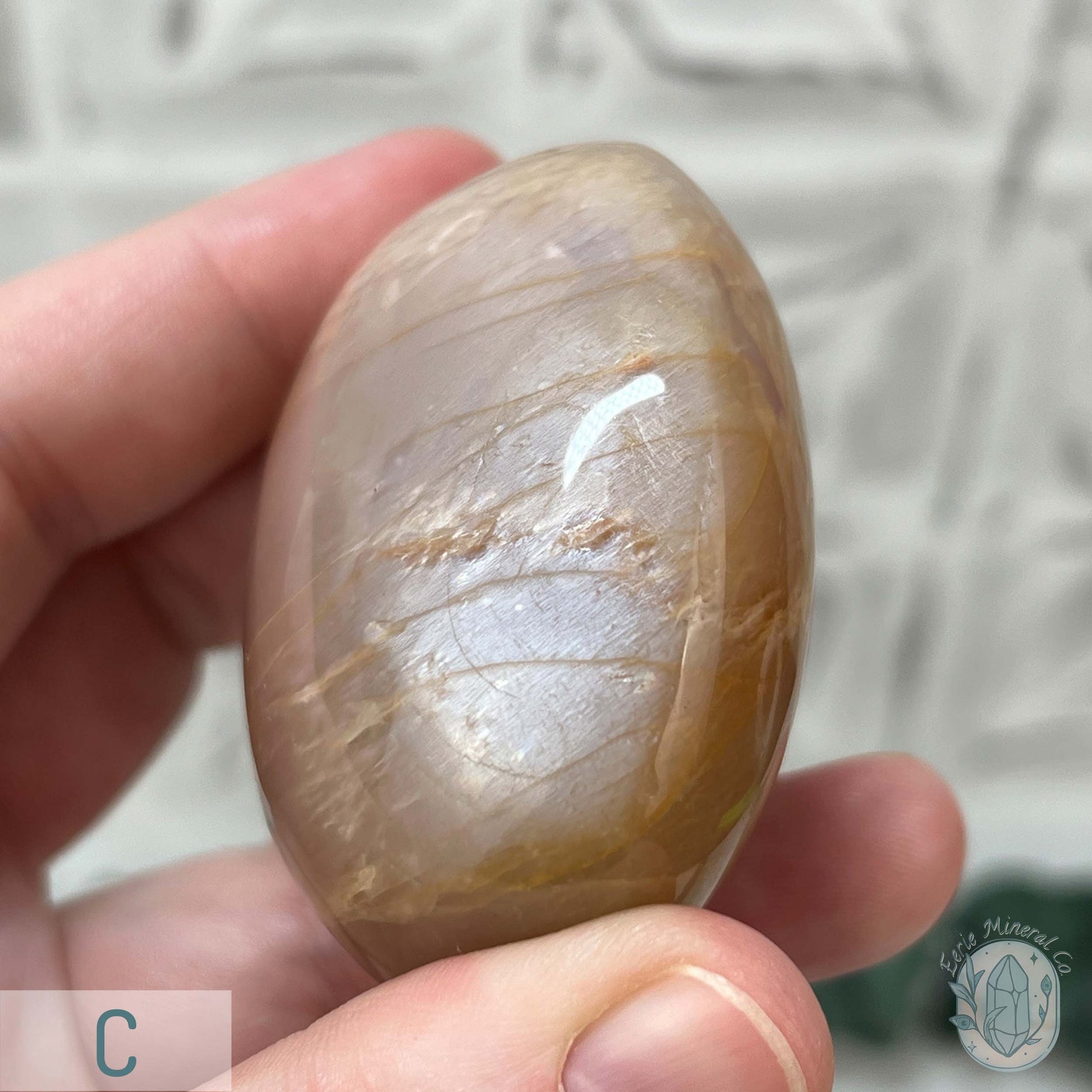Peach Mooonstone With Silver Flash Palm Stones
