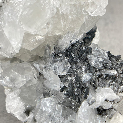 Apophyllite crystal with black chalcedony